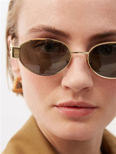 round gold metal sunglasses.